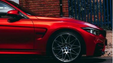 Photo of red car on road
